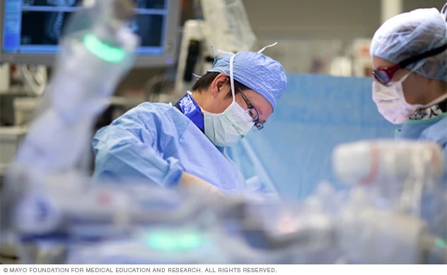 Robotic surgery used to place spinal screws.