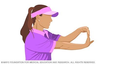 Person stretching the wrist muscles upward